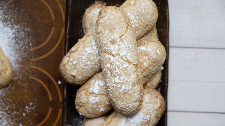 ladyfingers on black plate