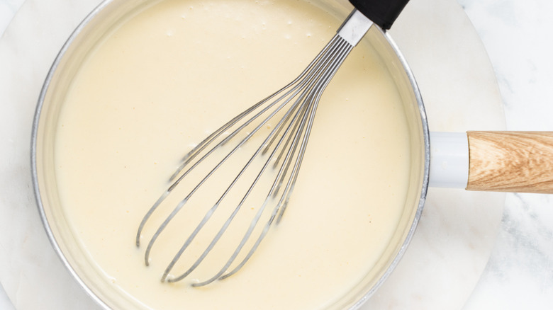 white sauce in a pan 