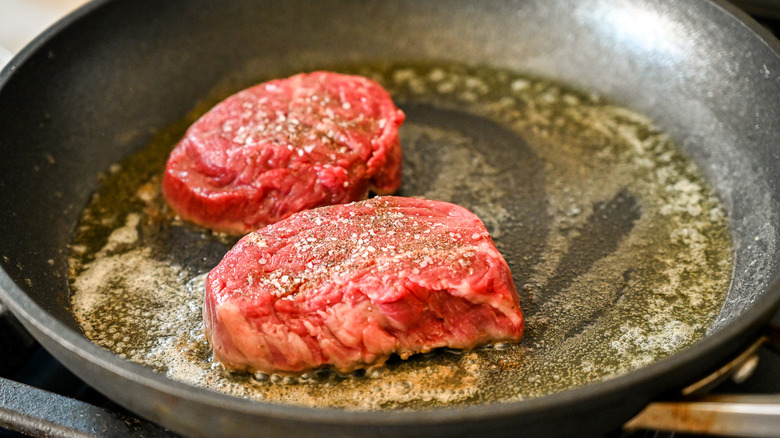 steaks in skillet 