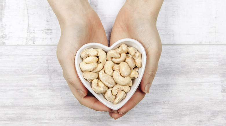 Cashew nuts in a heart shaped bowl