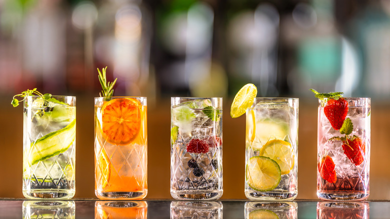 Line up of cocktails with fruit