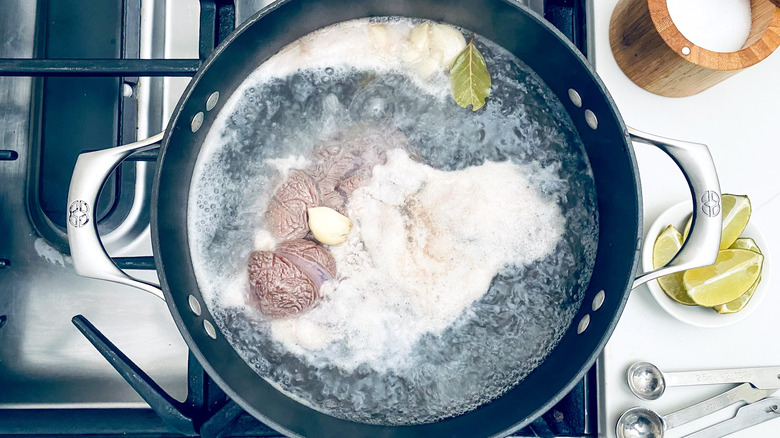 beef simmering in pot