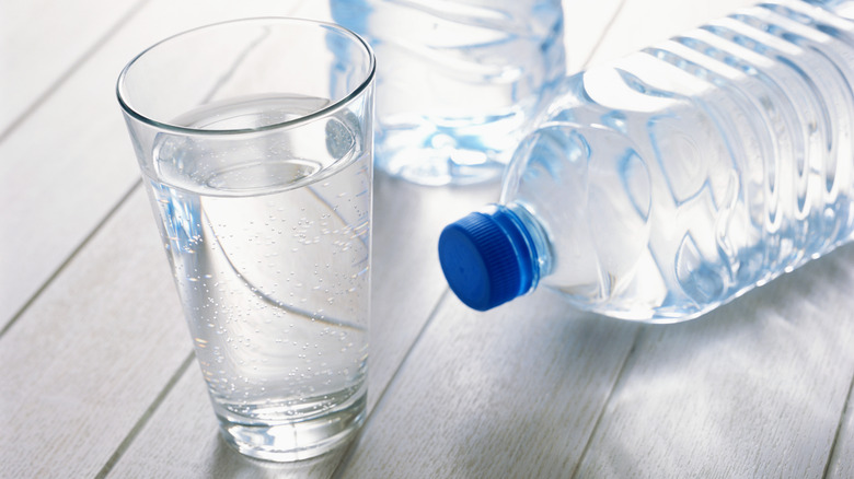 Water glass and plastic bottles