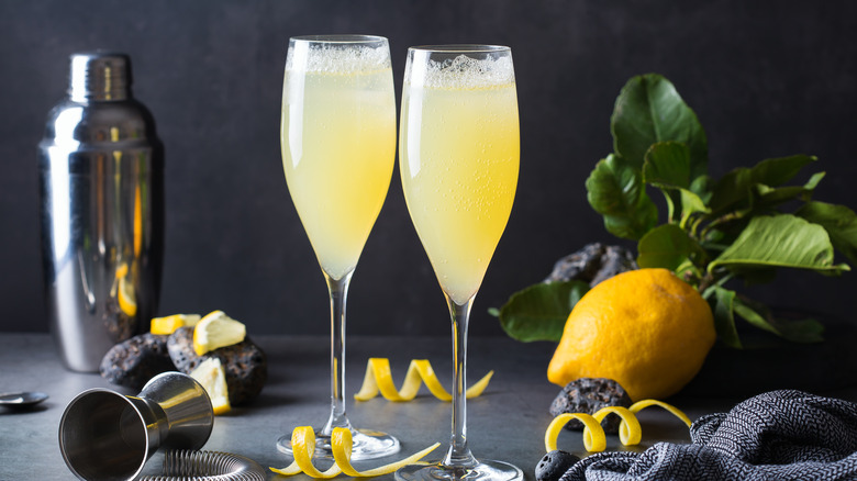 Two fluted cups filled with yellow liquid