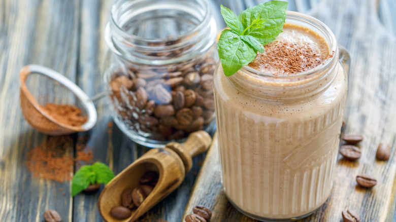 Coffee smoothie and jar of beans