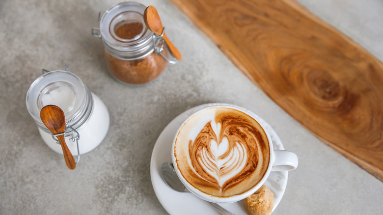 Coffee and two jars of sugar