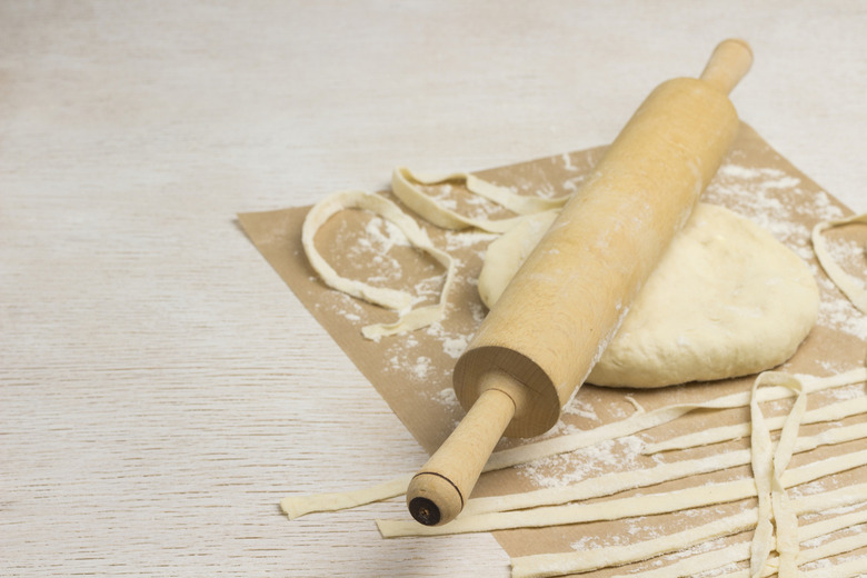 Use dowel rods when rolling out dough to keep it even