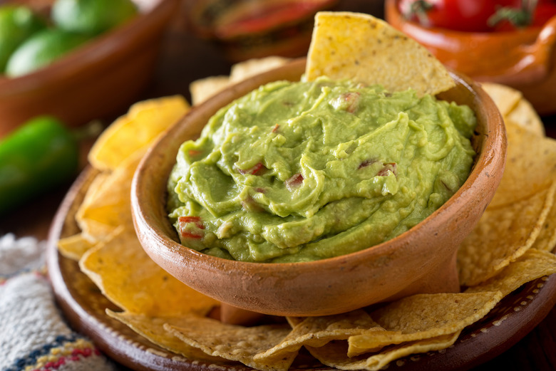 Water and plastic wrap will keep your guacamole fresh