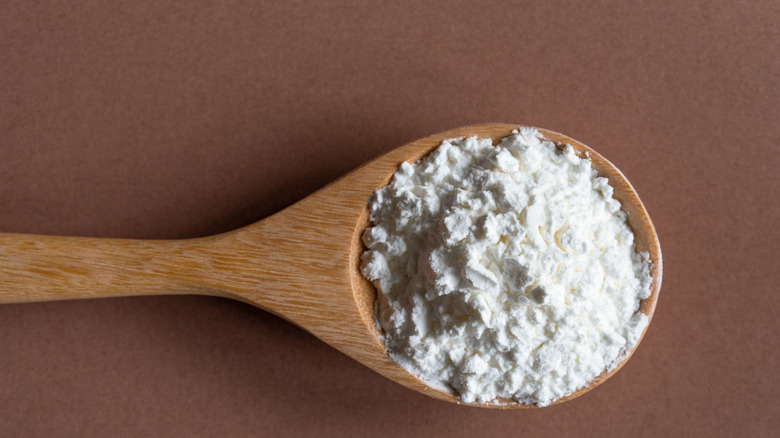 Cornstarch on a wooden spoon