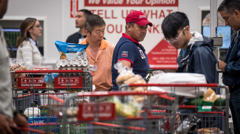 People pushing carts at Costco