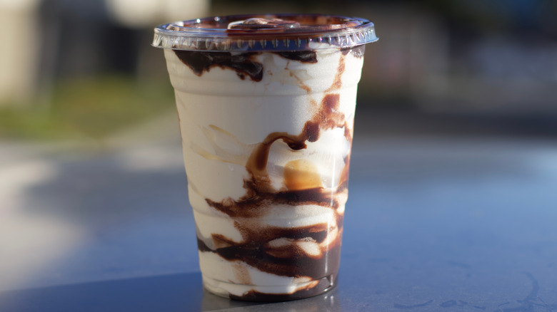 Ice cream sundae in a clear plastic cup