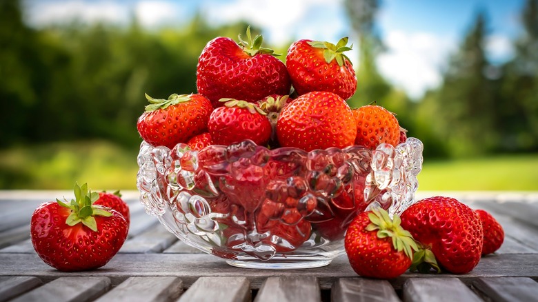 fresh strawberries in glass bowl