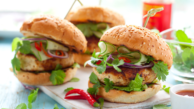 Turkey burgers on wooden board