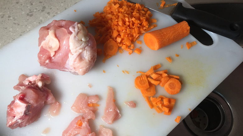 raw chicken with carrots 