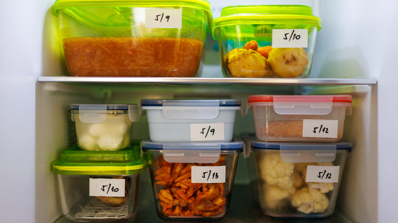 leftovers in tupperware in refrigerator