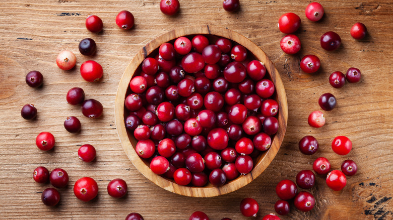 Cranberries on wooden background