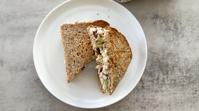 cranberry tofu salad sandwich sliced