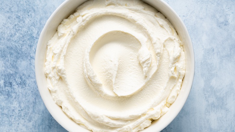 Cream cheese on gray background