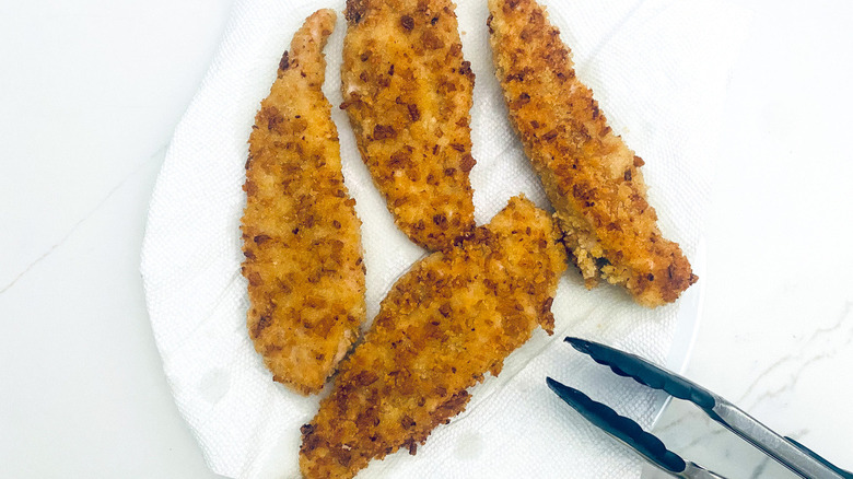 chicken tenders on white plate