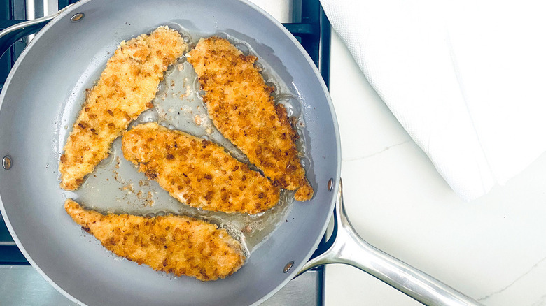 chicken tenders in frying pan