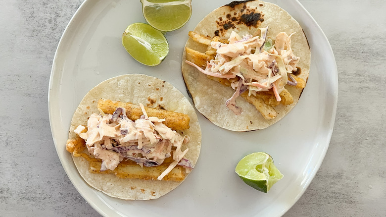 hearts of palm tacos with cabbage slaw and limes