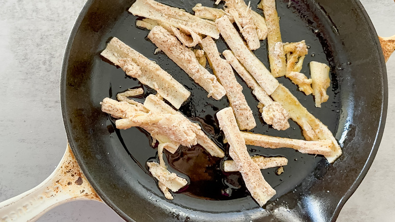 coated hearts of palm in skillet