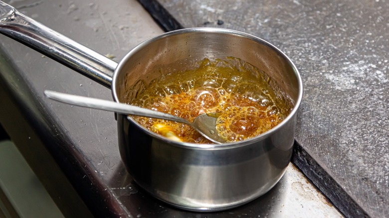 sugar caramelizing in sauce pan