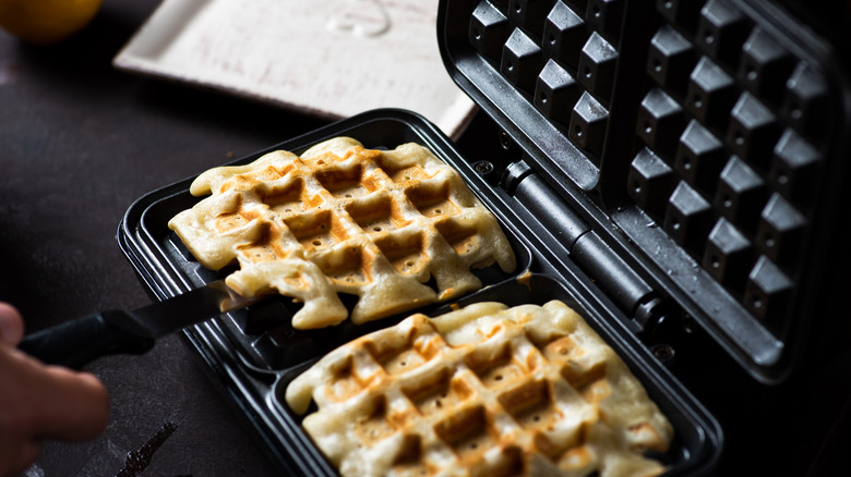 Waffle iron with two croffles inside