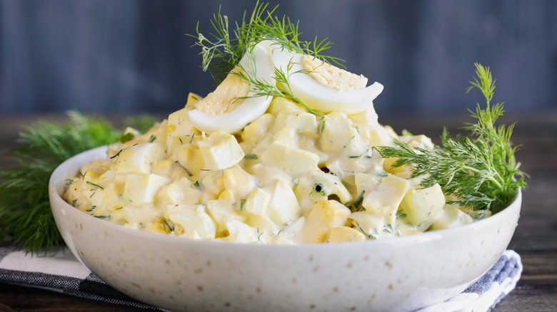 Egg salad with dill garnish