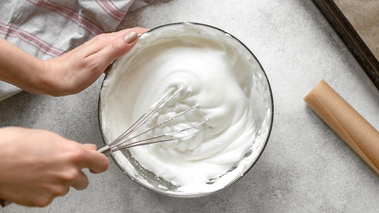 Person making whipped cream