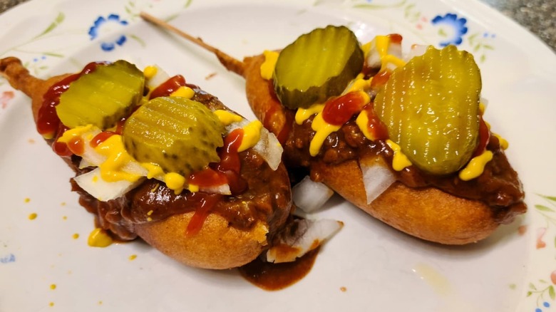 Chili corn dogs with toppings