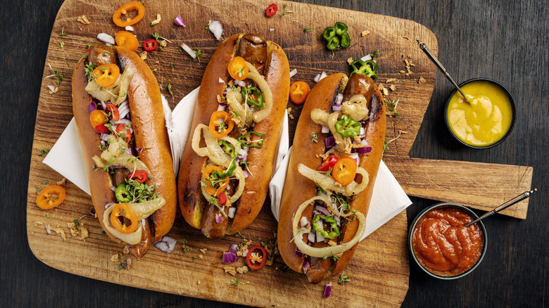 hot dogs on cutting board