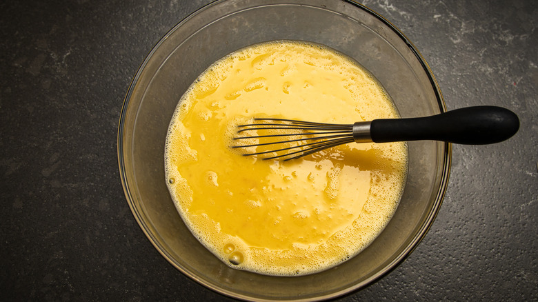 Whisking eggs in a bowl