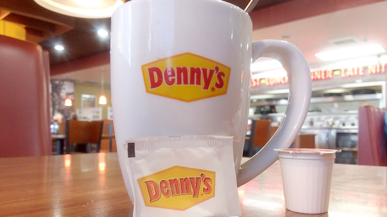 Denny's coffee mug with sugar packet