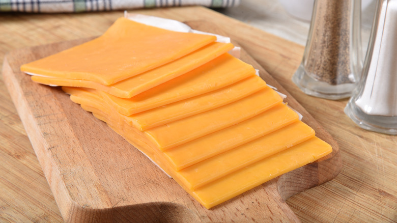 sliced cheese singles on board