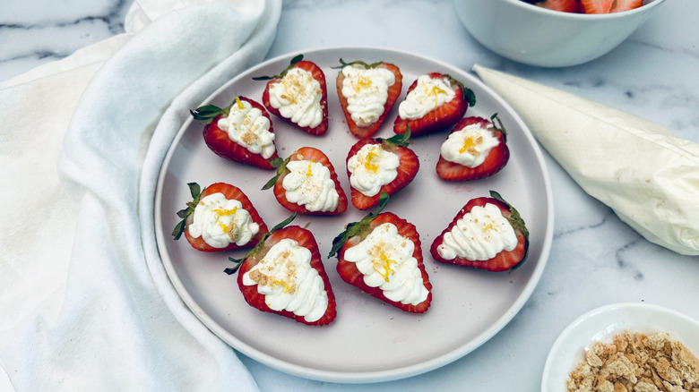 cheesecake stuffed strawberries on plate