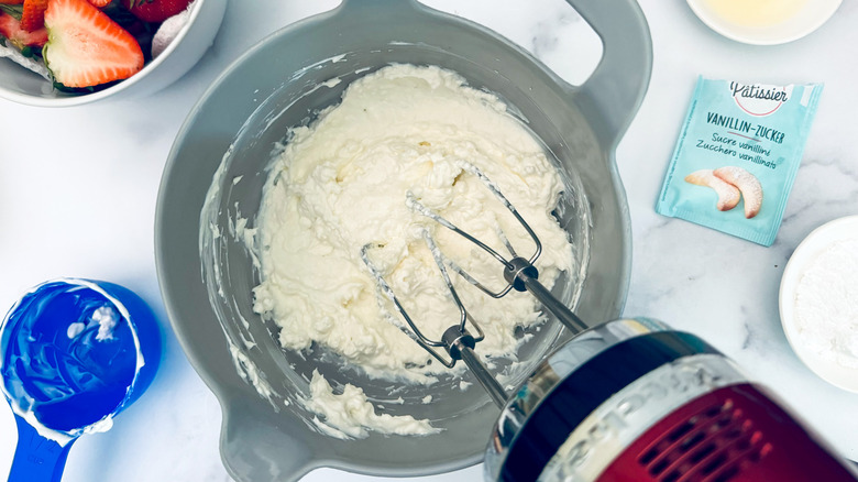 beating cream cheese and yogurt