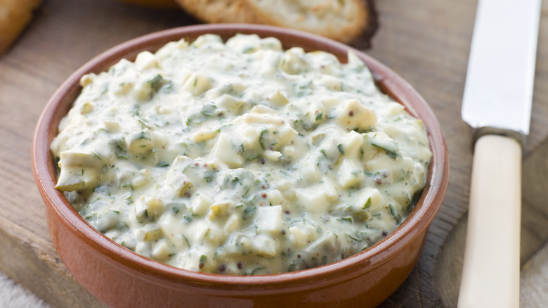 Bowl of gribiche and a knife