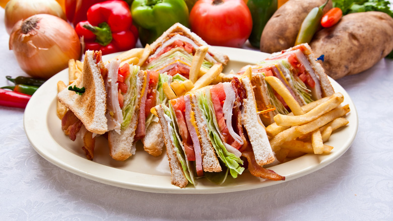 Club sandwich with fries