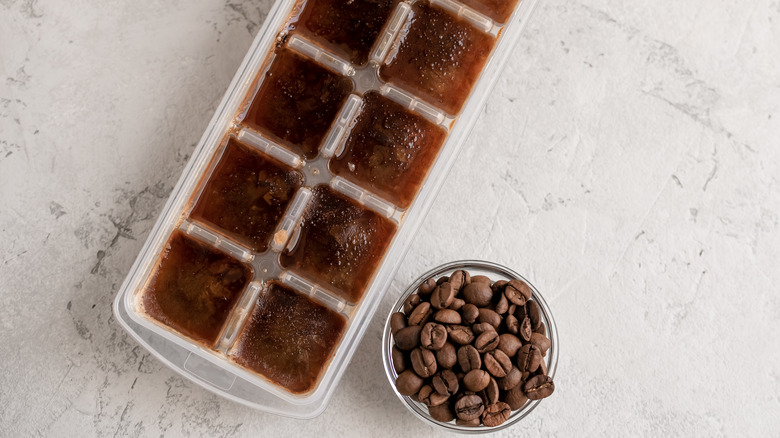 ice tray of coffee and bowl of beans