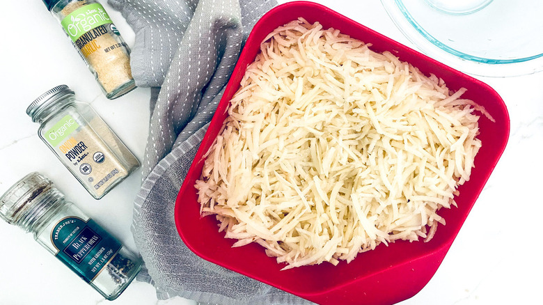 potatoes with seasonings and towel