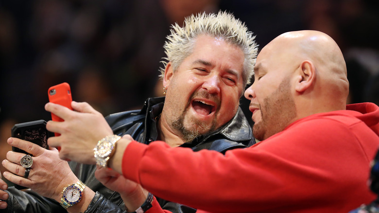 Guy Fieri laughing