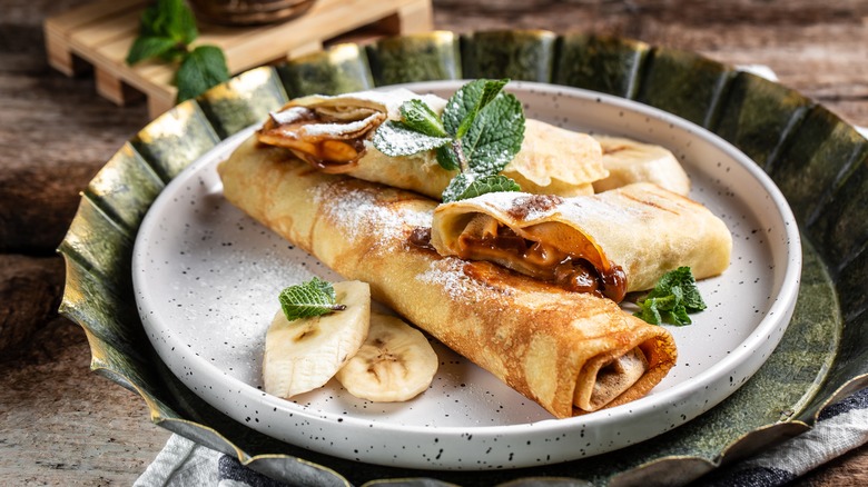 crepes on a plat with bananas