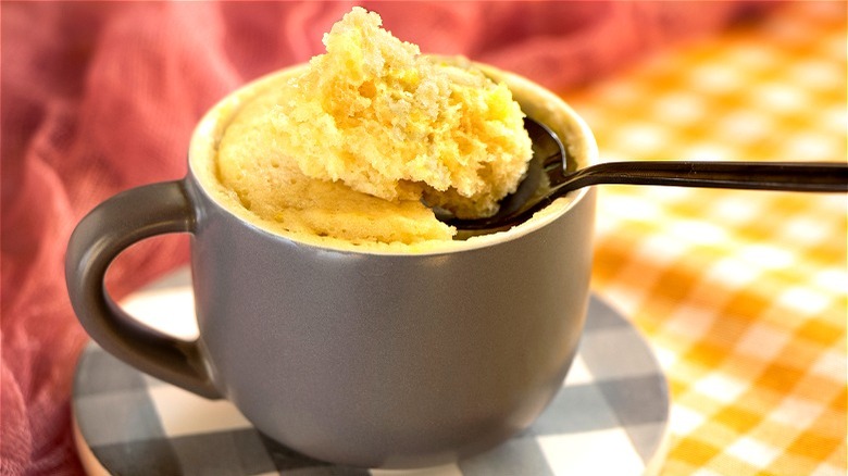 Vanilla mug cake in grey cup 