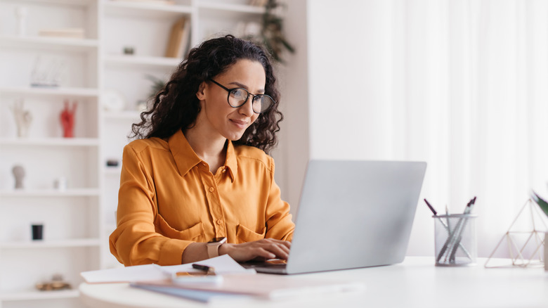 woman on laptop at desk 