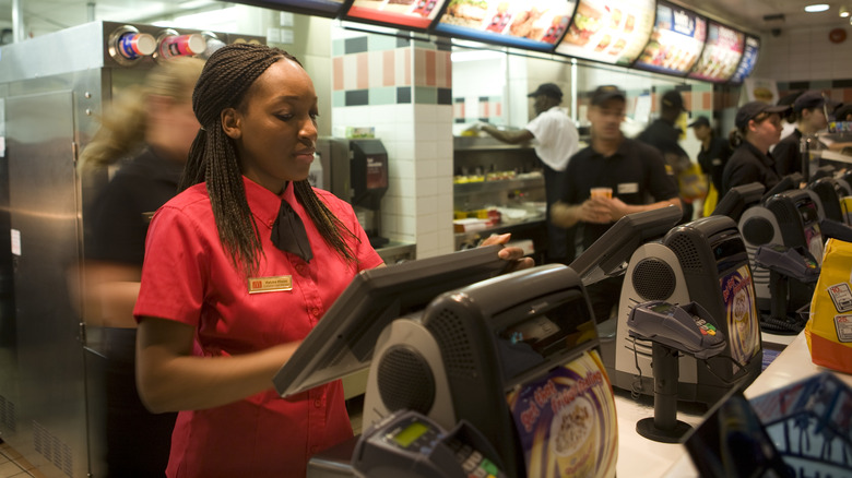 mcdonalds employees standing