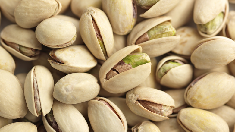 A pile of pistachios in shells