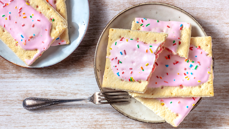 strawberry frosted pop tarts on plate, fork