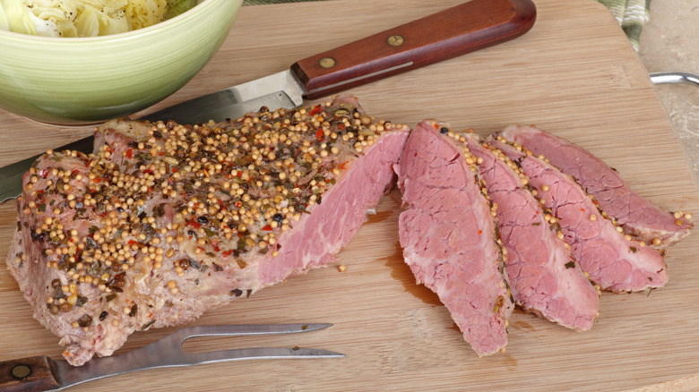 Corned beef on cutting board