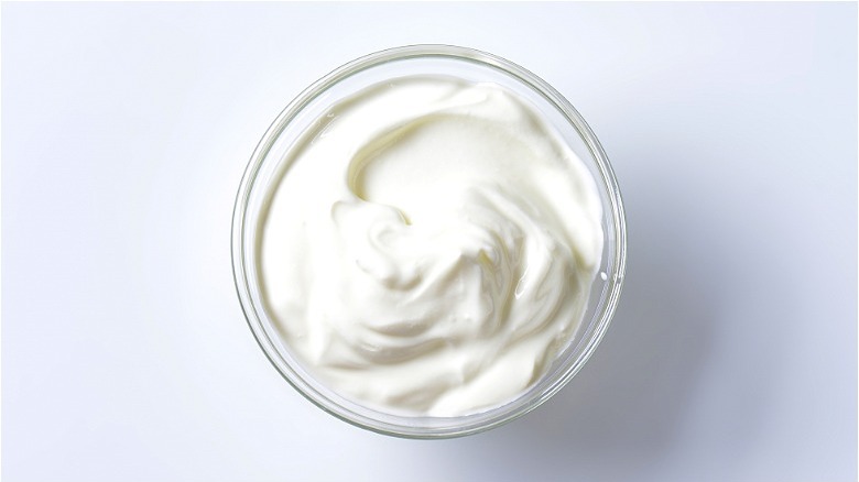 Clear bowl of sour cream